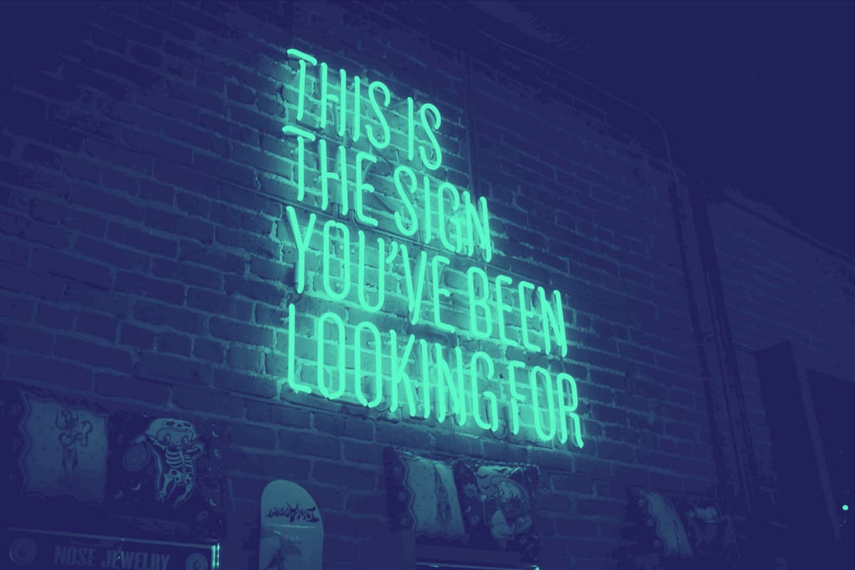 Image with light tubes spelling out the sentence "this is the sign you've been looking for'